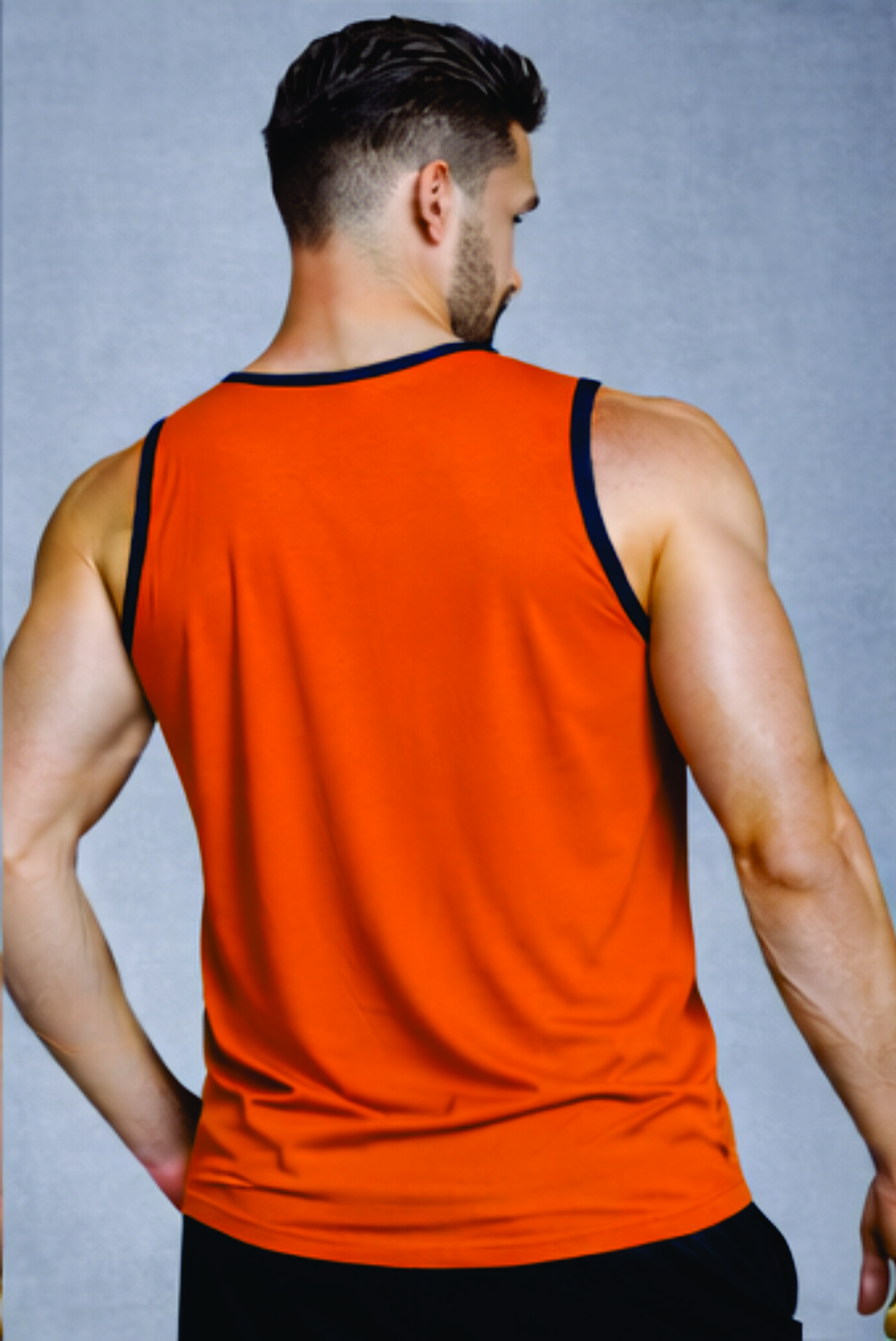 Second image of Men Solid Slim Fit Scoop Neck Sports Innerwear Vest with RHYNOMAX COOL+ (Orange)